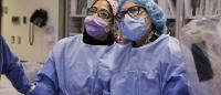 Dr. McEntegart performs a procedure in the cardiac cath lab